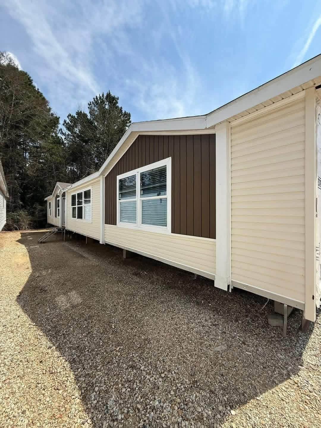 The Mobile Home Rocker 4 Bedrooms • 2 Bathrooms