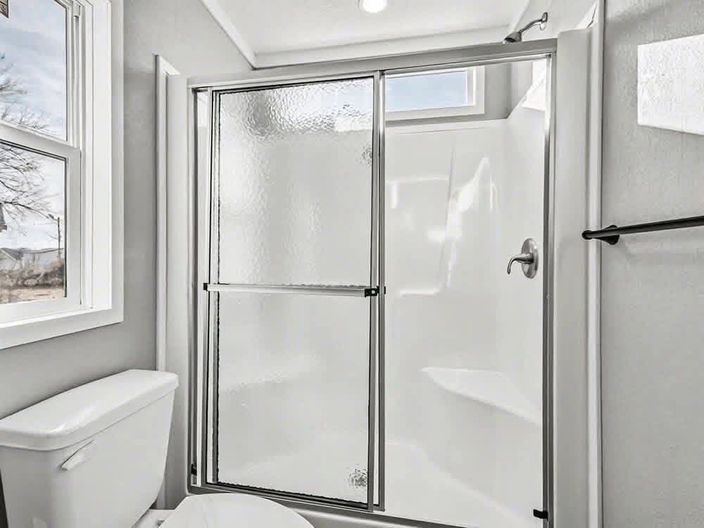 THE SKY MOBILE HOME;  2 bedrooms  2 baths  16′ x 66′  990 sqft