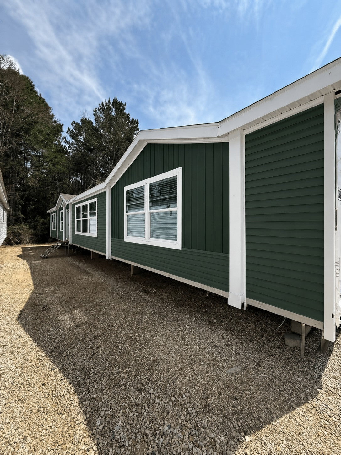 The Mobile Home Rocker 4 Bedrooms • 2 Bathrooms