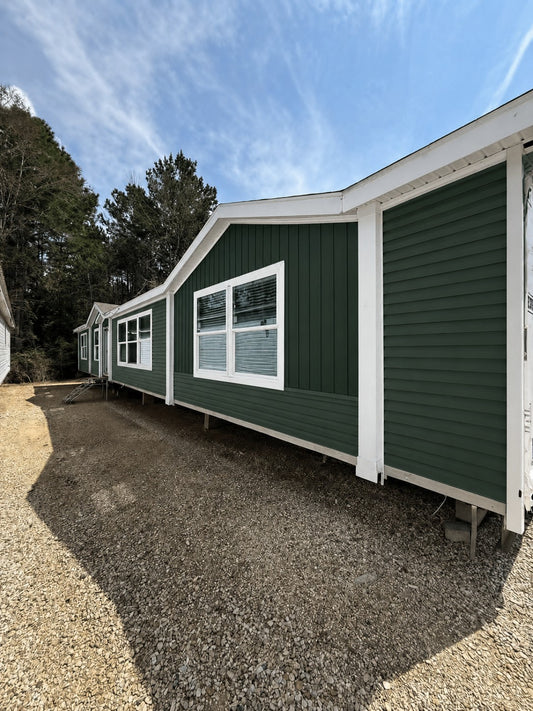 The Mobile Home Rocker 4 Bedrooms • 2 Bathrooms